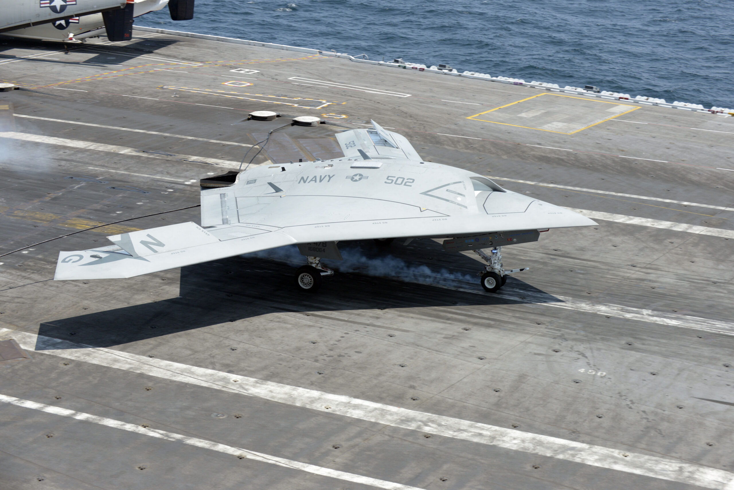 X-47B UCAS demonstrator makes successful landing on an aircraft carrier.